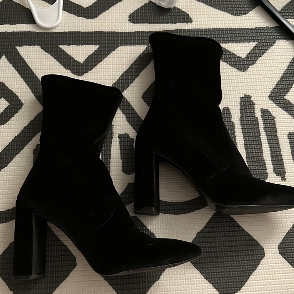 Black Stuart Weitzman boots leather sole